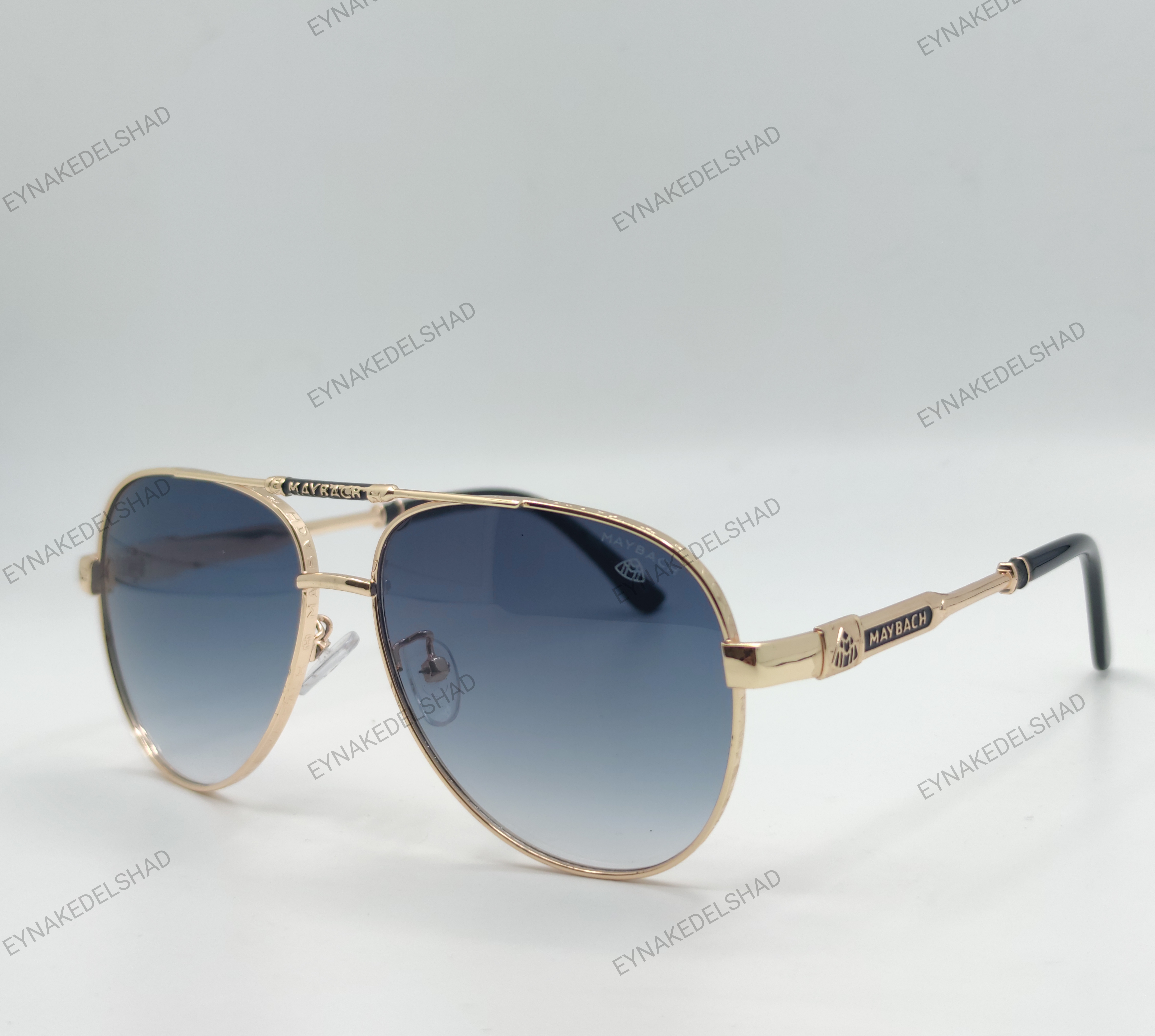 عینک فرم طلایی لنز سبز